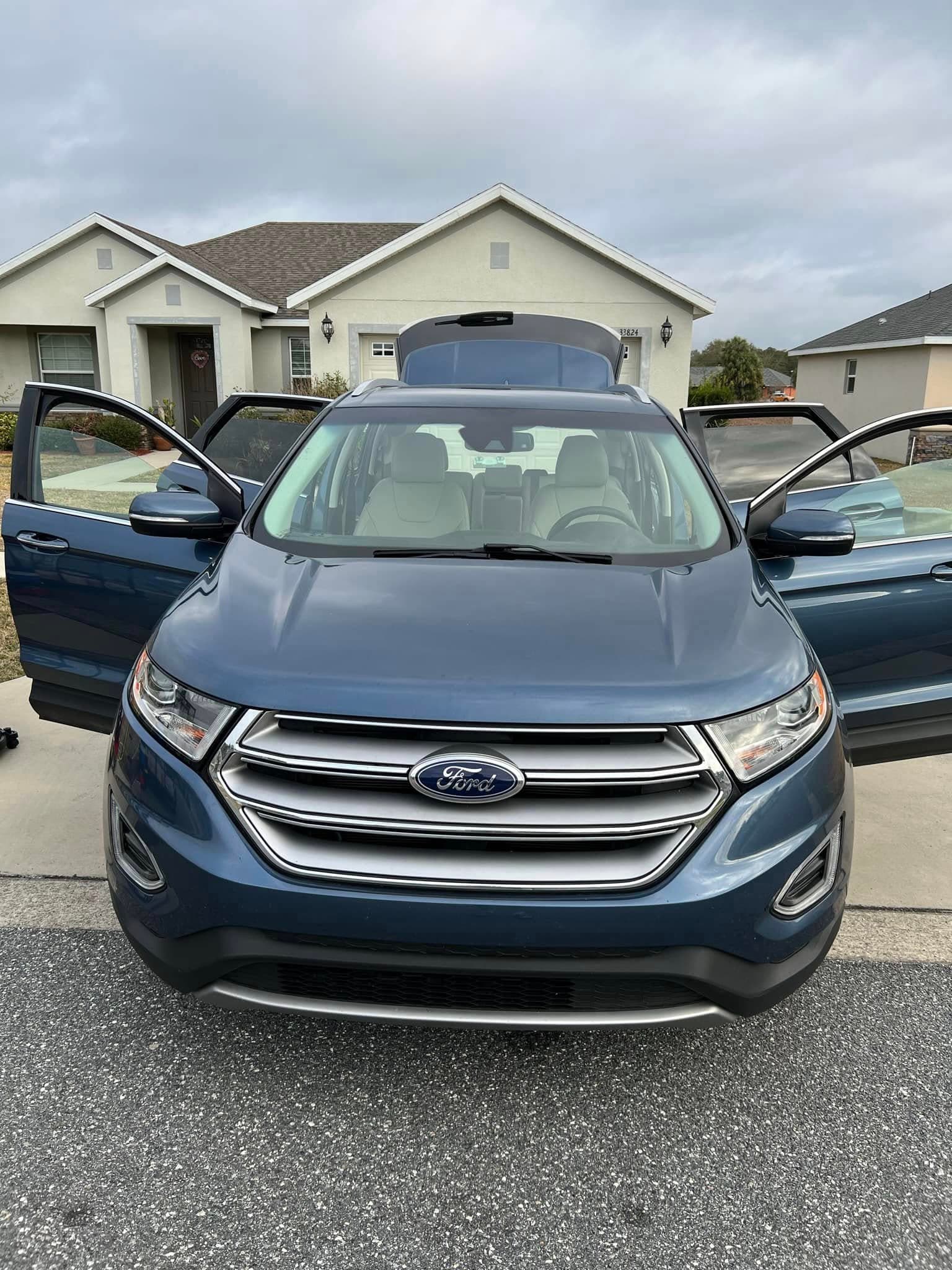 SUV washed in driveway