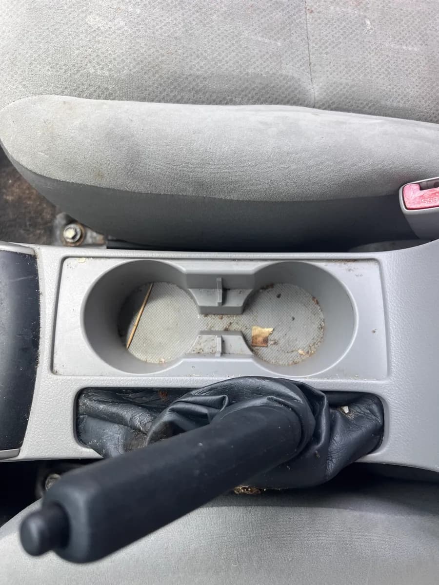 Cup holder and shifter area — before