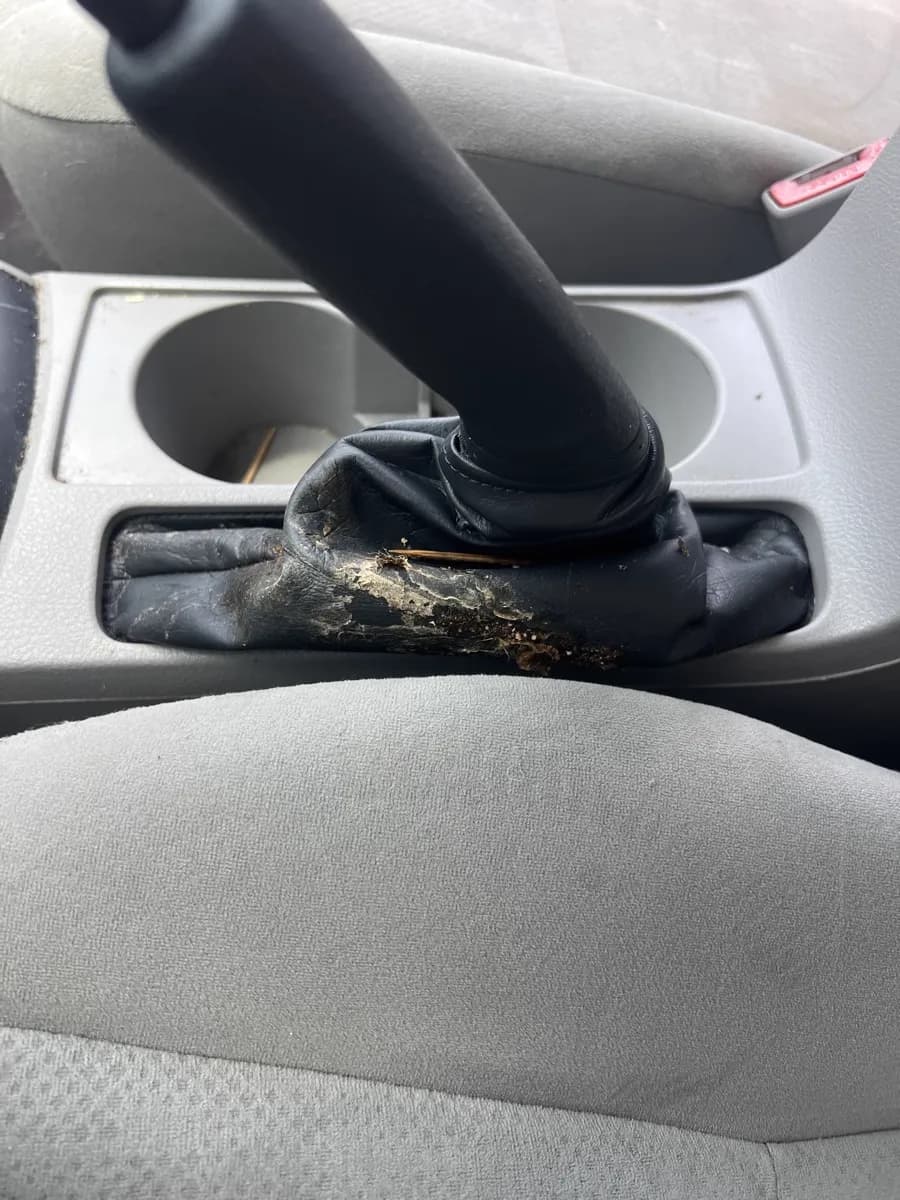 Shifter boot buildup — before